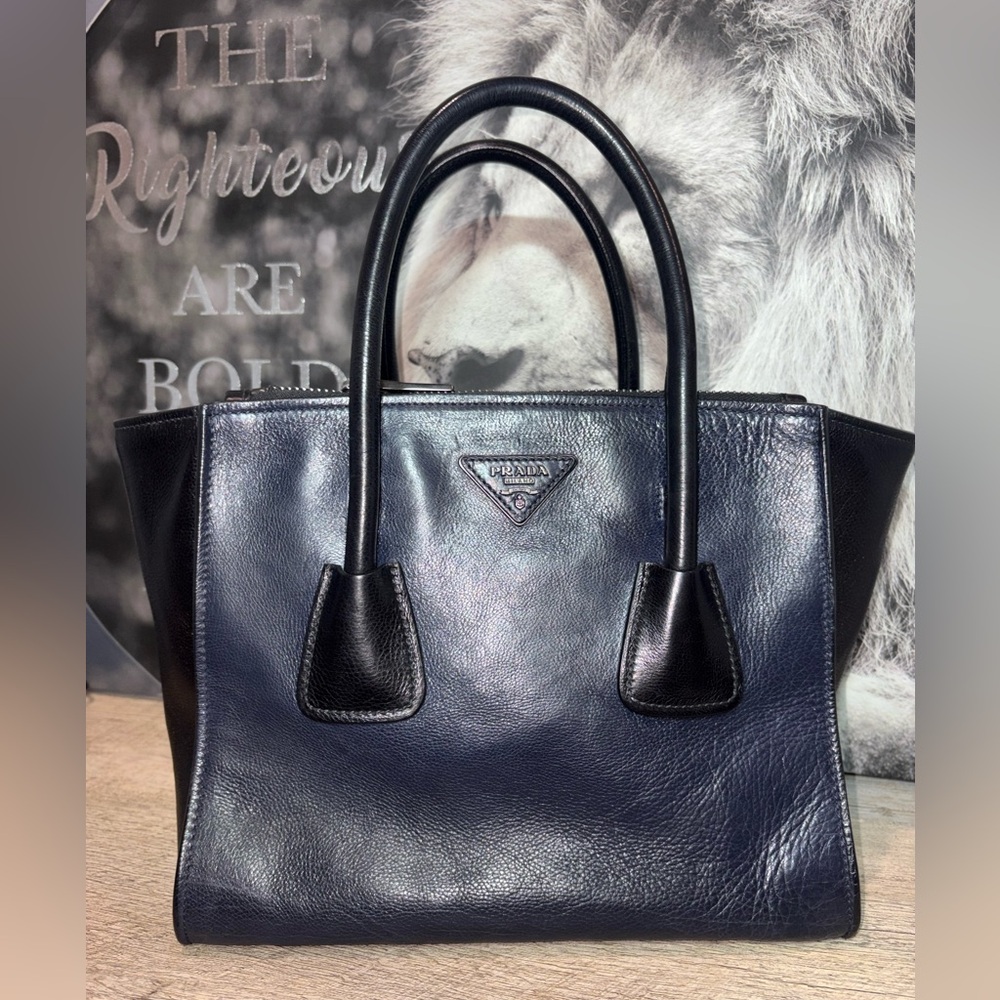 This is a Prada Glace Calf Twin Pocket tote bag in navy blue and black leather.